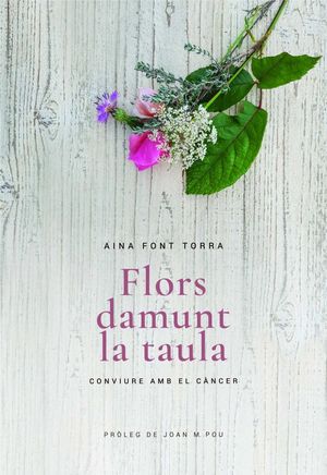 FLORS DAMUNT LA TAULA *